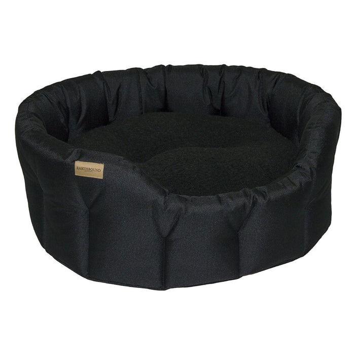 سرير كلب أسود مستدير كلاسيكي مقاوم للماء من Earthbound مقاس متوسط